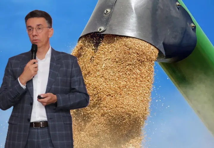 Mężczyzna w garniturze przemawia na tle strumienia zbóż. Dyskusja o cenach zbóż.